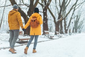 Couple,Walking,By,Snowed,City,Park,Talking,Socializing.,Romantic,Date